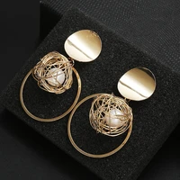 temperament metal ring hollow gold ball pearl pendant earrings female personality exaggeration chaoren net red earrings