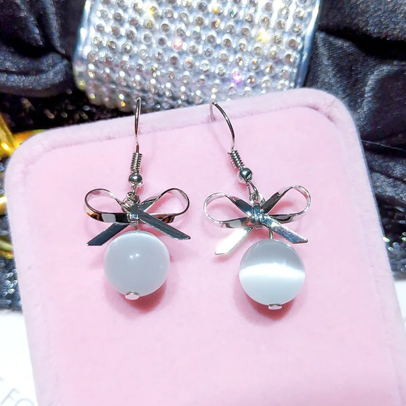 

Fashion Exquisite Metal Bowknot Opal Women's Earrings Personality Temperament Exquisite Earrings Earrings Wholesale
