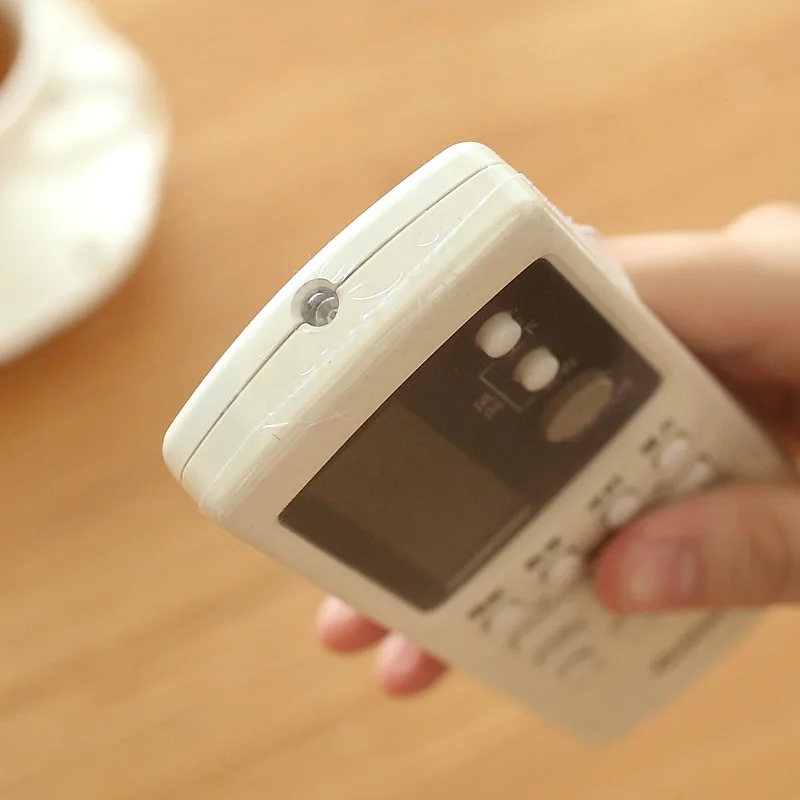 

1set=5pcs 27*12cm Dust Proof Waterproof Heat Shrink Film Clear Video TV Air Condition Remote Cover Case Storage Bags Protector