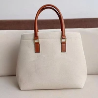 2021 classic female luxury handbag with high grade canvas with contrasting color cowhide handle large capacity shopping bag