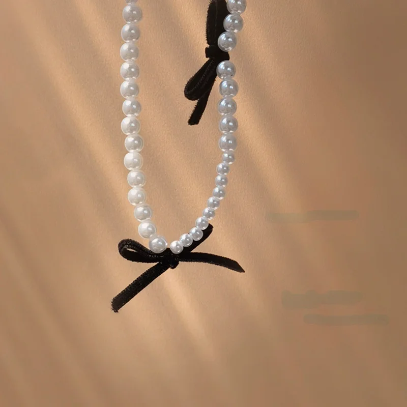 

Women Jewelry Simulated Pearl Necklace Sweet Design Vintage Temperament Black Bow Choker Necklace For Girl Lady Gifts Wholesale