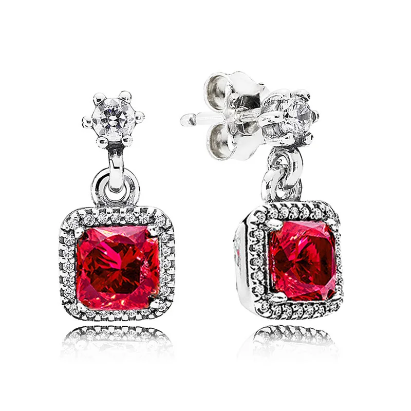 Женские серьги гвоздики серебряного цвета с кристаллами и