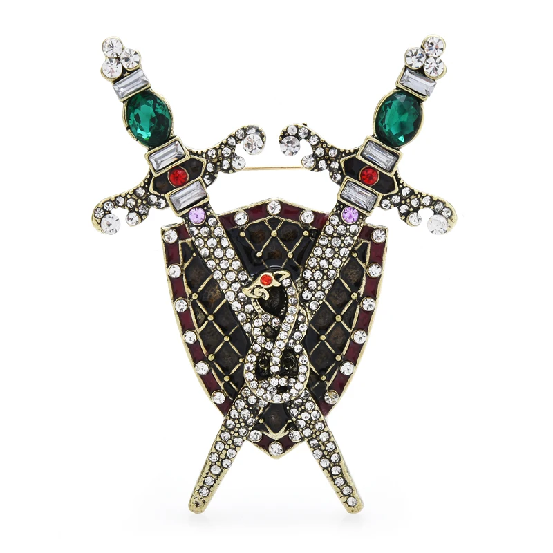 Брошь со стразами в виде мечей и щита |