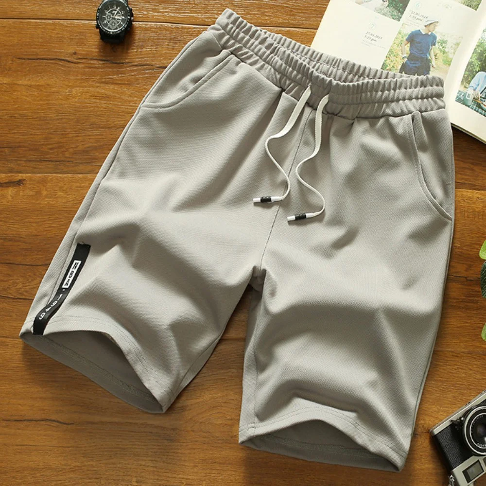 

Men Casual Short Pants Loose Beach Sports Cropped Shorts Drawstring Summer Plus Size