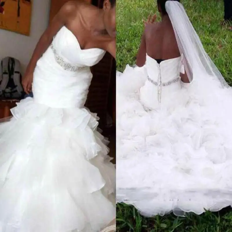 

African White Plus Size Mermaid Wedding Dresses 2022 Sweetheart Pleat Tiered Ruffles Crystal Sash Trumpet Wedding Gowns