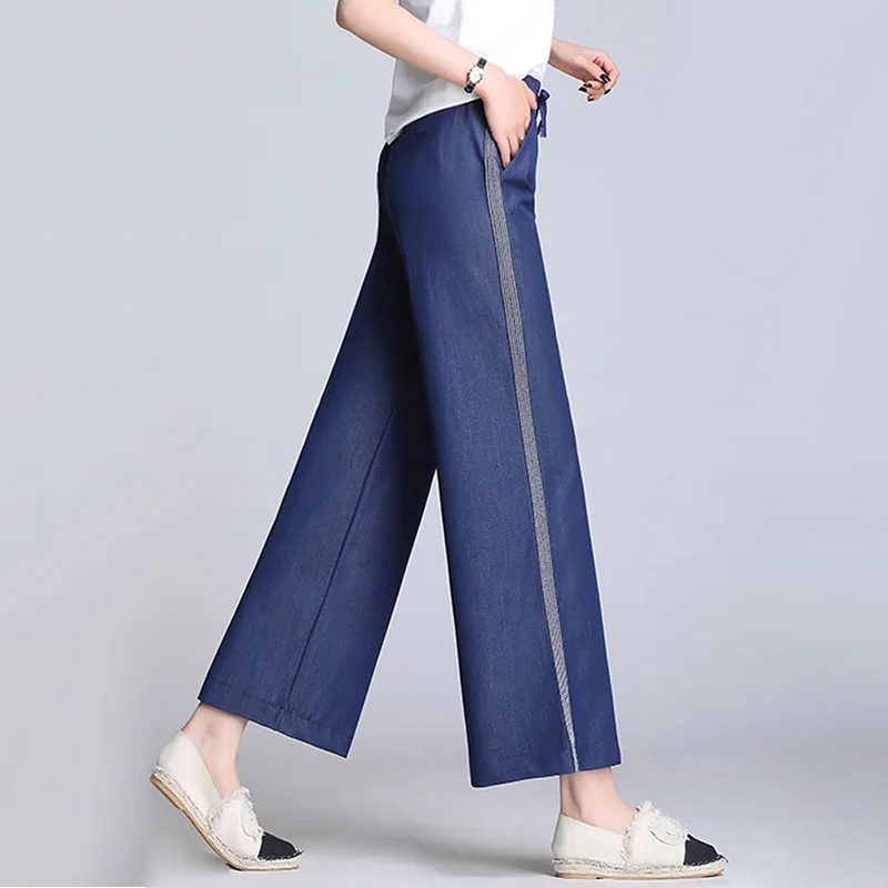 Женские летние джинсы с широкими штанинами тонкие однотонные на шнуровке