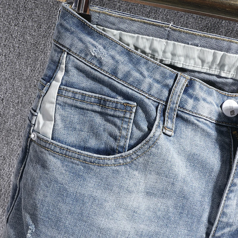 Korean Style Men Jeans Retro Light Blue Elastic Slim Ripped Jeans Men Street Fashion Patched Designer Casual Denim Pencil Pants