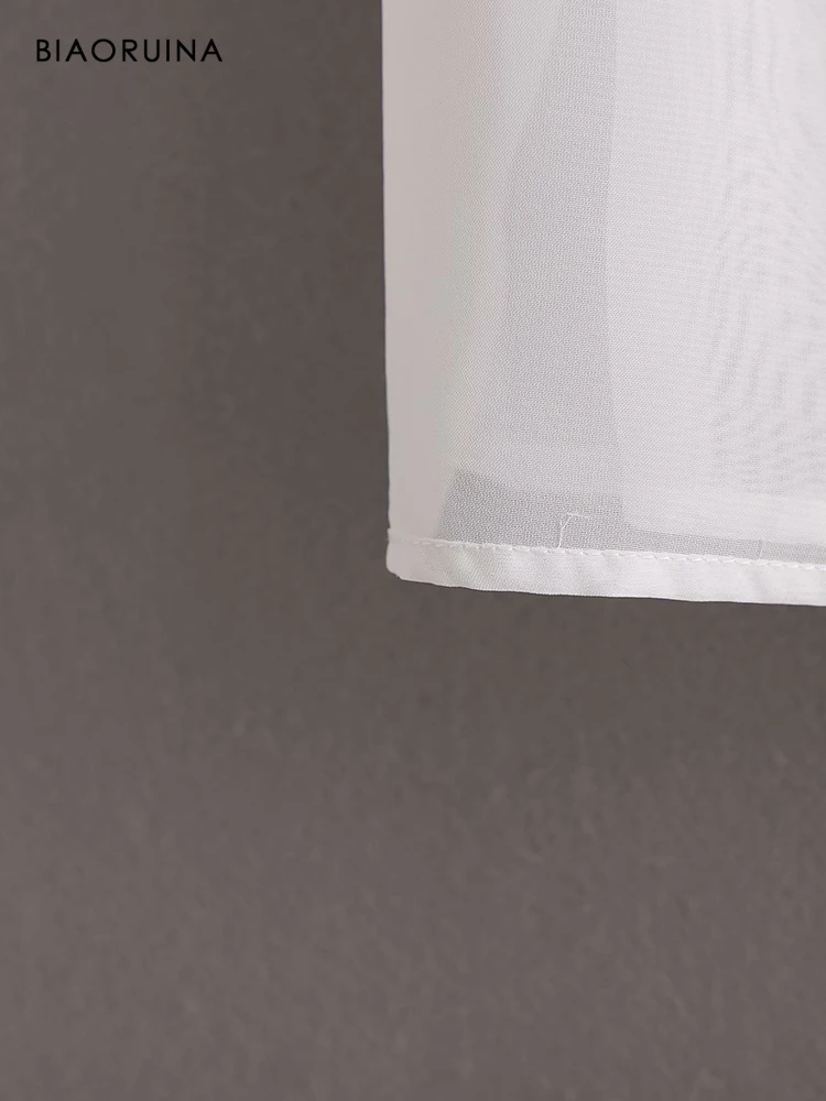 

BIAORUINA Women's Silver Sequined High Waist Fashion Long Skirt Tassels Hem Female Club Style Elegant Skirts New Arrival