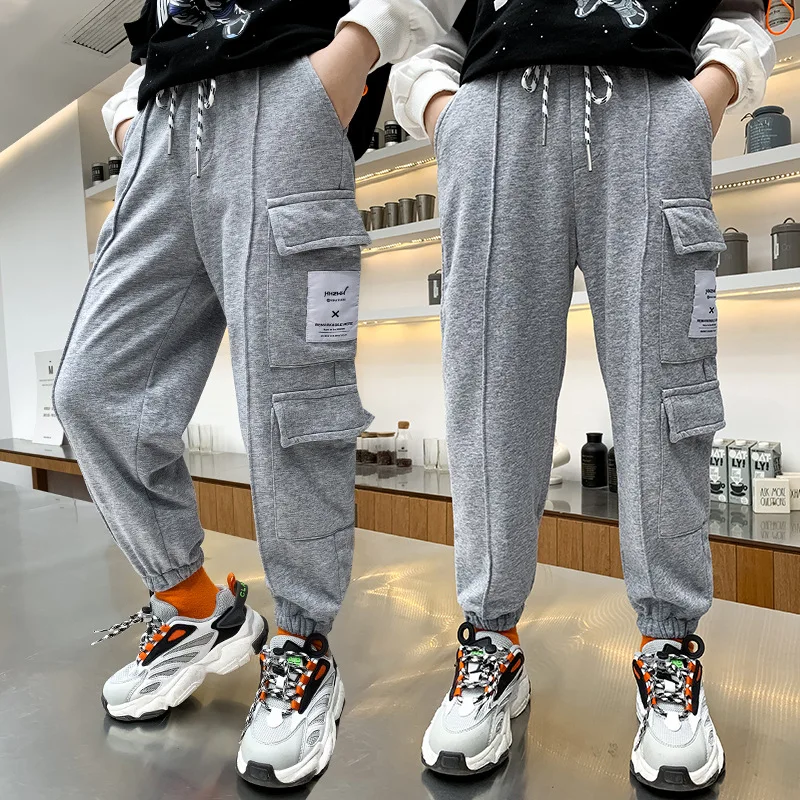 

2021 spring and autumn boys' casual sports trousers, big children's knitted overalls
