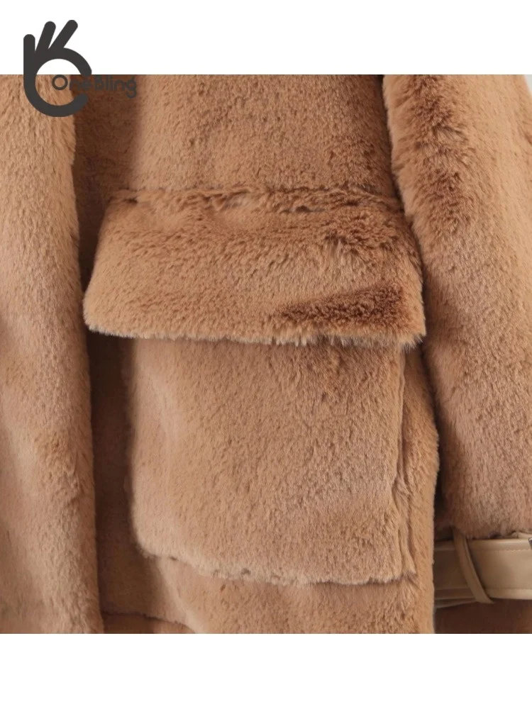 Куртка женская зимняя стеганая с воротником-хомутом и искусственным лисьим