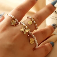 temperament pearl elastic tail ring simple and creative small gold bead butterfly love pendant ring for women girl new year gift