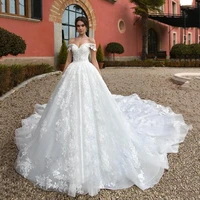 2021 new romantic boat neck lace up ball gown wedding dresses luxury beaded appliques chapel train princess bride gown