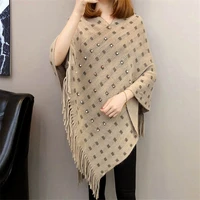 autumn and winter knitted tassels in the long section of the shawl new loose cape coat female bat shirt dropshipping