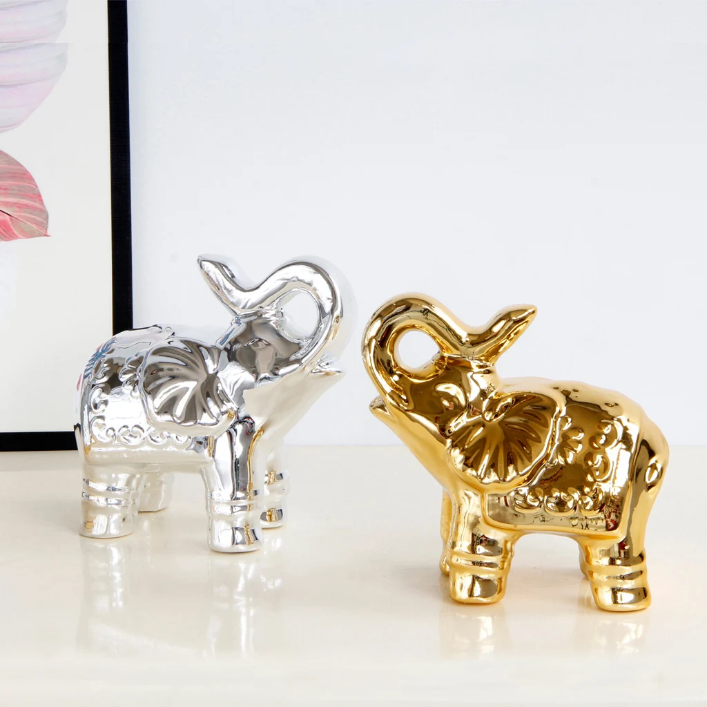 

Cute Ceramic Elephant Figurines Sculpture Suitable for Home Decor 2 Colors