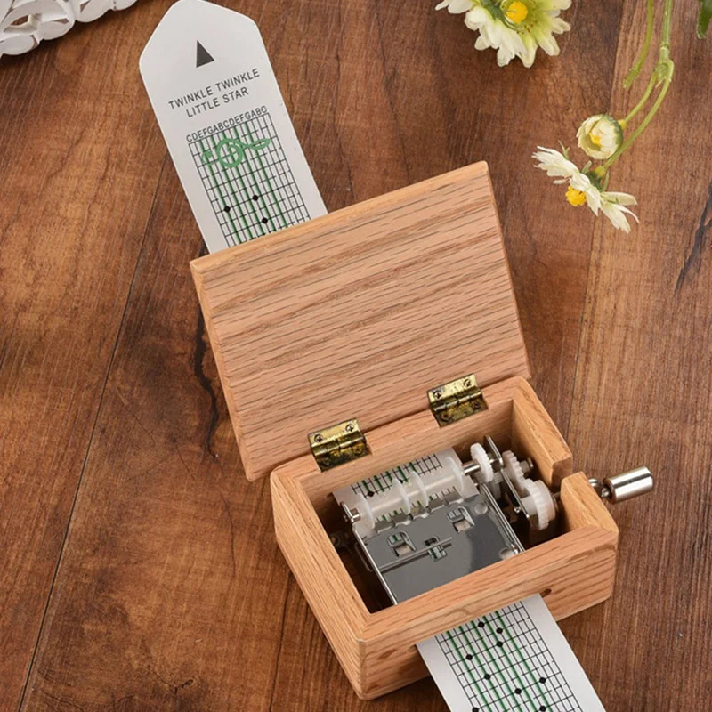 

Hand Crank Music Box with Hole Punch and 5 Paper Tape Music Action Box 15 Sound Box Can Be DIY Can Compose A Gift