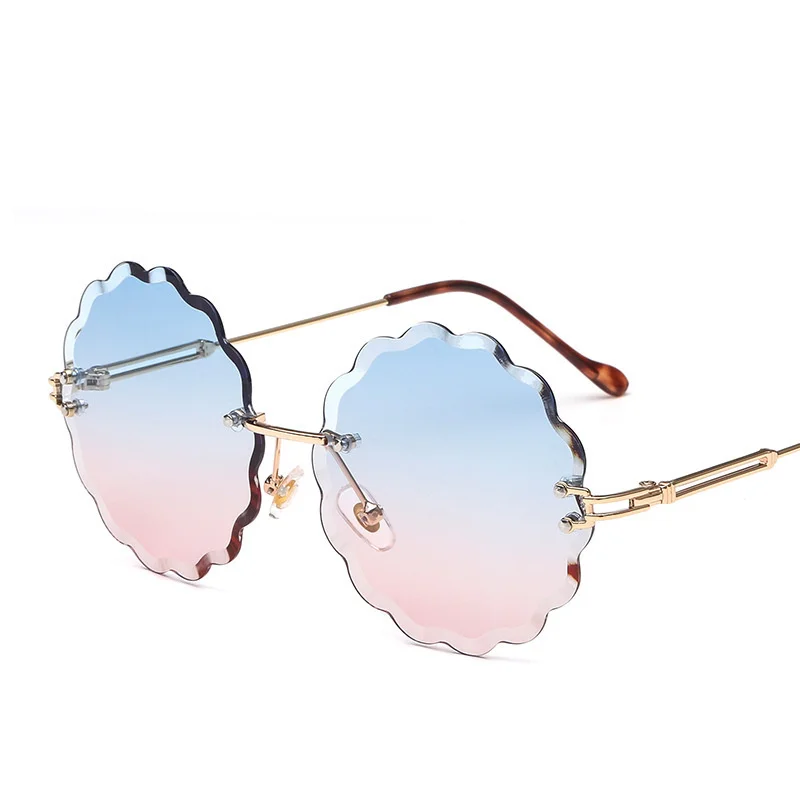 

Free shipping New style meihuaduo frameless cut edge personalized decoration fashion Sunglasses ocean color glasses