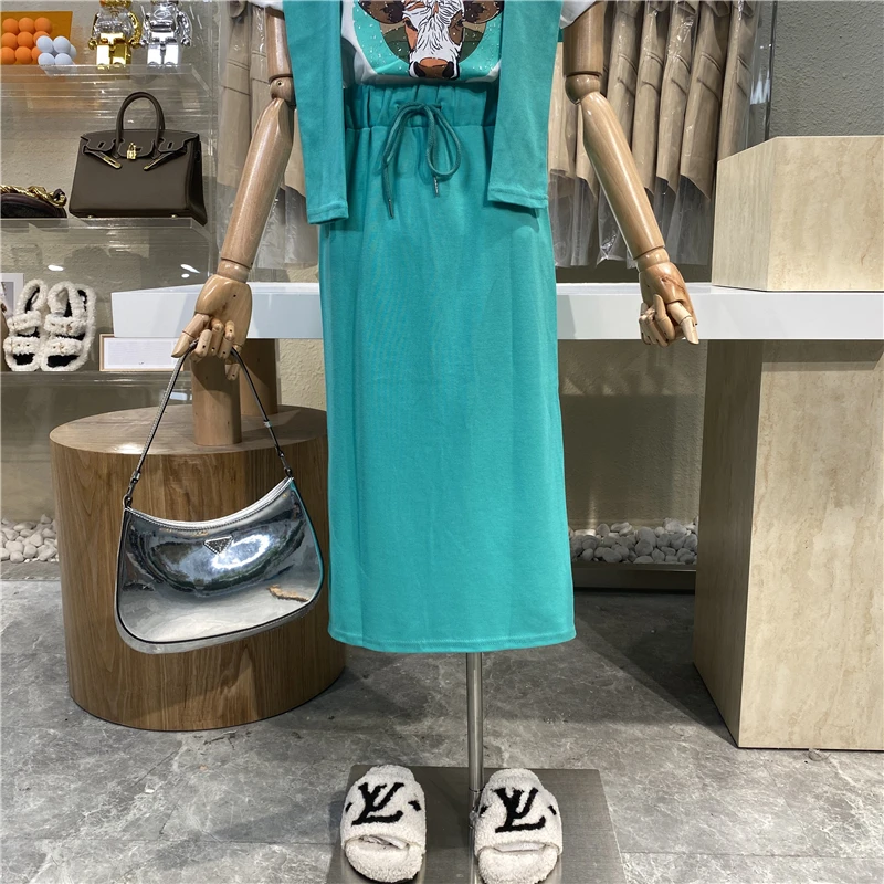 

Niche Design 2021 Cartoon Pattern Round Neck Short Sleeve Loose T-shirt + Rope High Waist Skirt + Shawl Suit