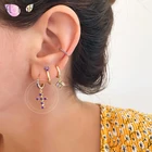 Женские серьги-кольца с крестом из серебра 925 пробы