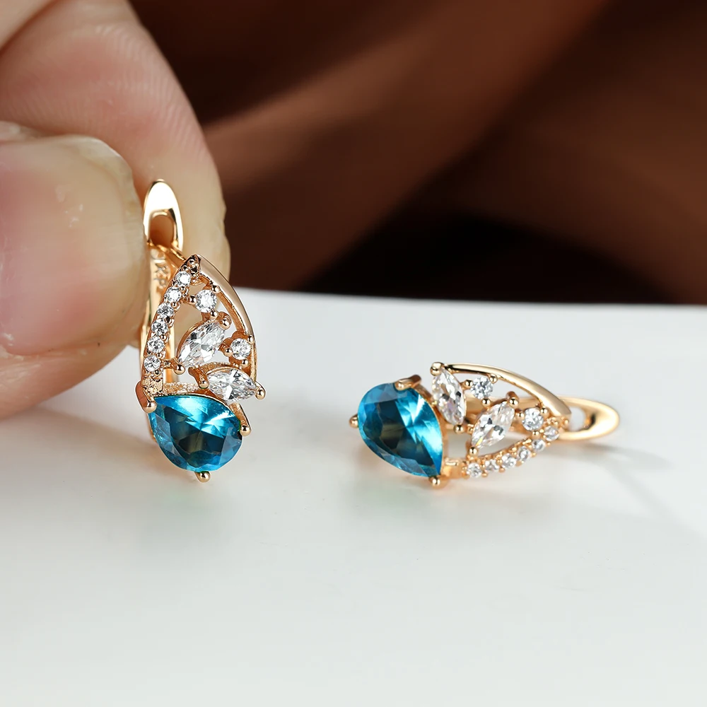 

Dainty Aqua Blue Zircon Dangle Earrings for Women 14K Gold Water Drop Hollow Leaf Design Earrings Ear Buckle Clips Jewelry Gift