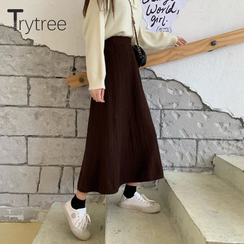 Женская трикотажная юбка в полоску до середины икры | одежда