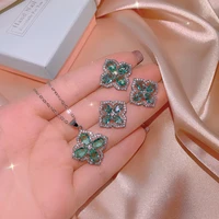 2022 new inlaid emerald zircon aaaa four leaf clover pendant necklace earrings ring three piece jewelry set