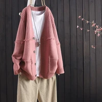 2021 spring and autumn casual loose solid color casual long sleeved buttoned knitted cardigan sweater jacket women
