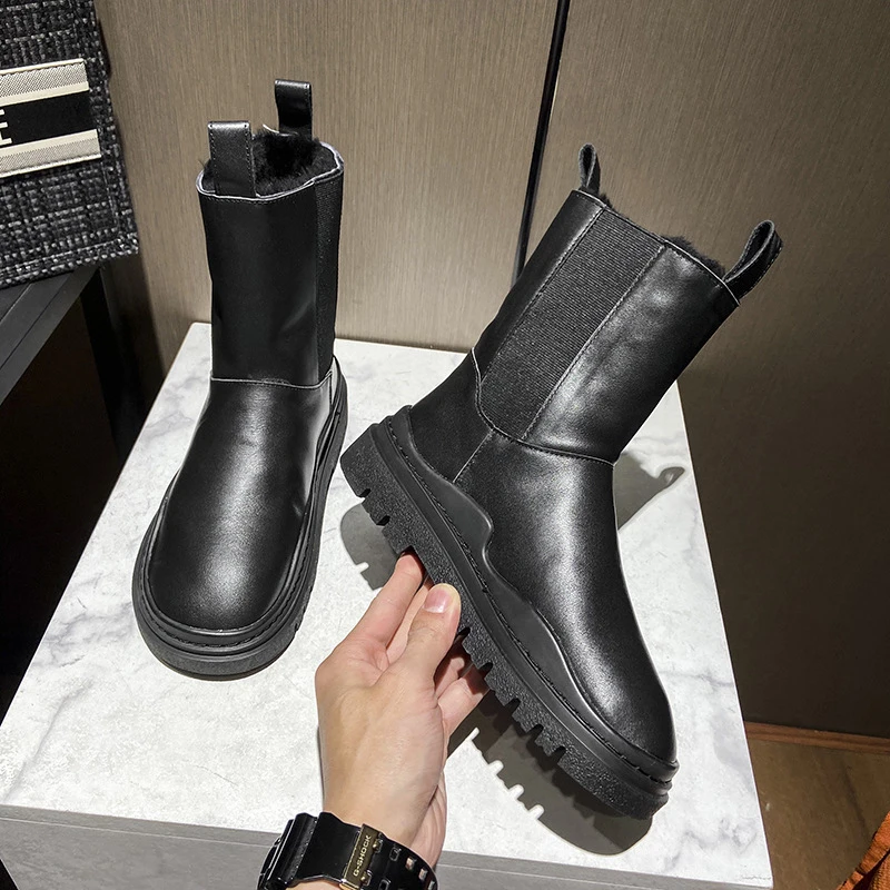 Женские кожаные зимние сапоги на платформе