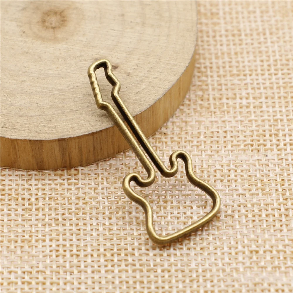 

free shipping 23pcs 40x17mm antique bronze guitar charms diy retro jewelry fit Earring keychain hair card pendant accessories