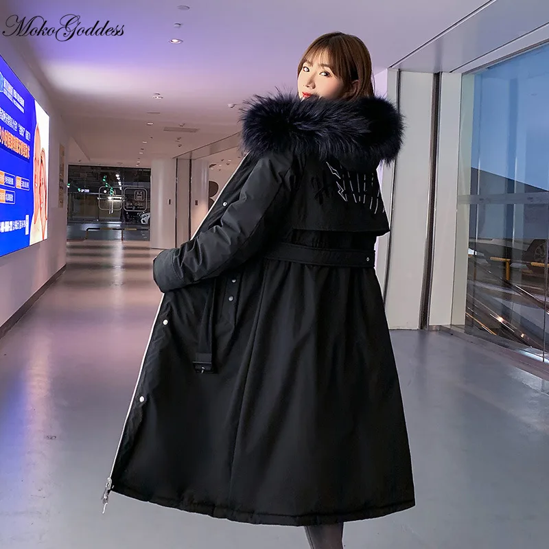 Женская зимняя куртка с капюшоном и меховым воротником регулируемой талией |