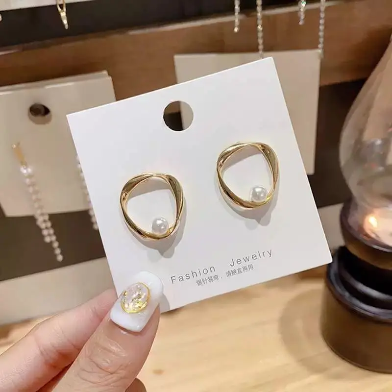 

Minimalism Small Pearl Earring Irregular Golden Geometric Earrings Hollow Pearl Jewelry Wholesale