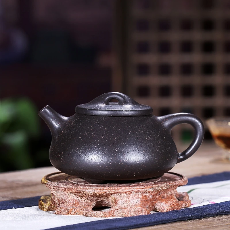 

Yixing purple Clay teapot black gold sand ball hole stone scoop pot Kung Fu tea set teapot 250ml