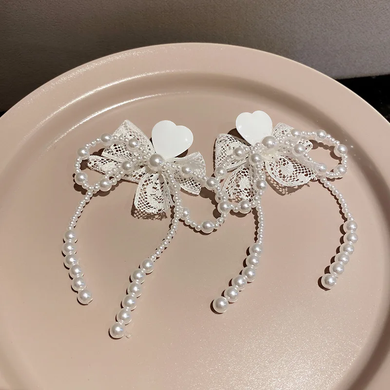 

Origin Summer Vintage Fairy White Bowknot Imitation Pearl Dangle Earring for Women Metallic Love Heart Lace Earring Jewelry