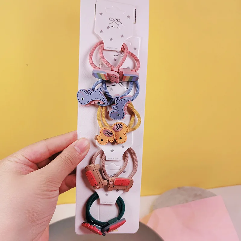 10 шт. Мультяшные резиновые повязки для волос различных цветов и дизайнов