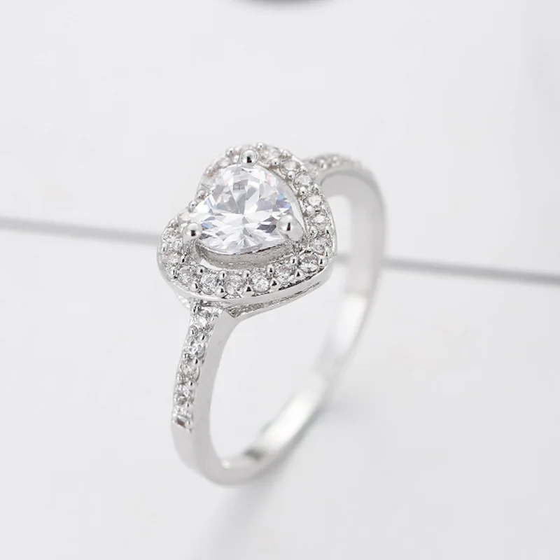 Серебряное кольцо с аметистом сердцем и драгоценными камнями синим сапфиром