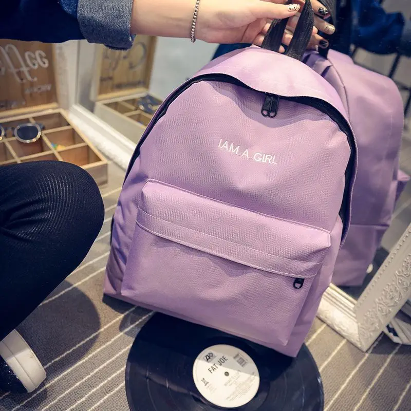 

The new simple fashion letter solid color canvas shoulder bag
