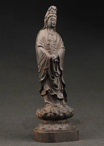 

Elaborate Chinese decorative manual old ebony wood kuan Yin statue.