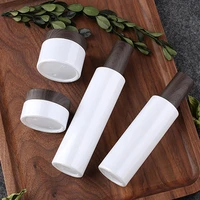 white frosted glass bottle with wooden pump lid 30ml 100ml 4oz 30g 50g glass jar with dark wood cap face cream lotion body scrub