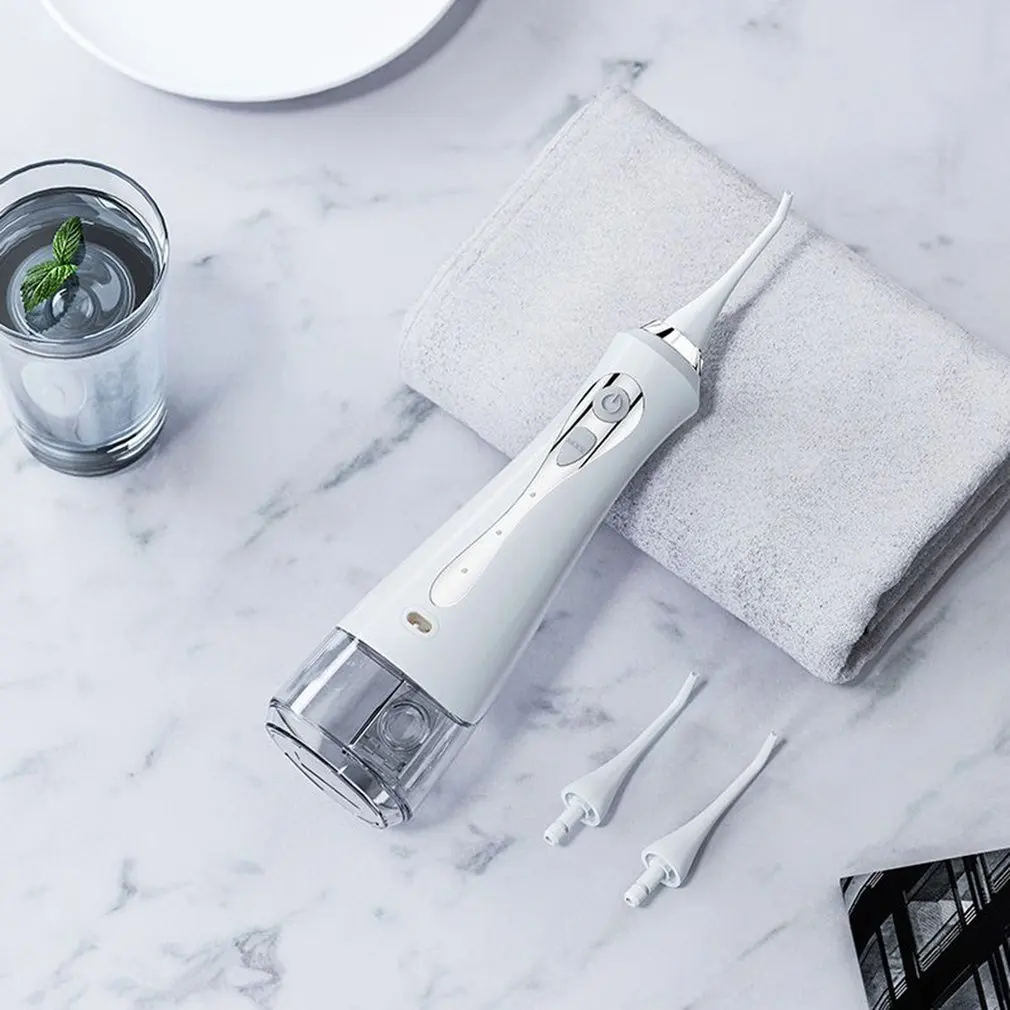 

Oral Irrigator Electric Dental Flusher Teeth Washing Machine Household Portable Dental Flosser Water Floss With 4 Heads