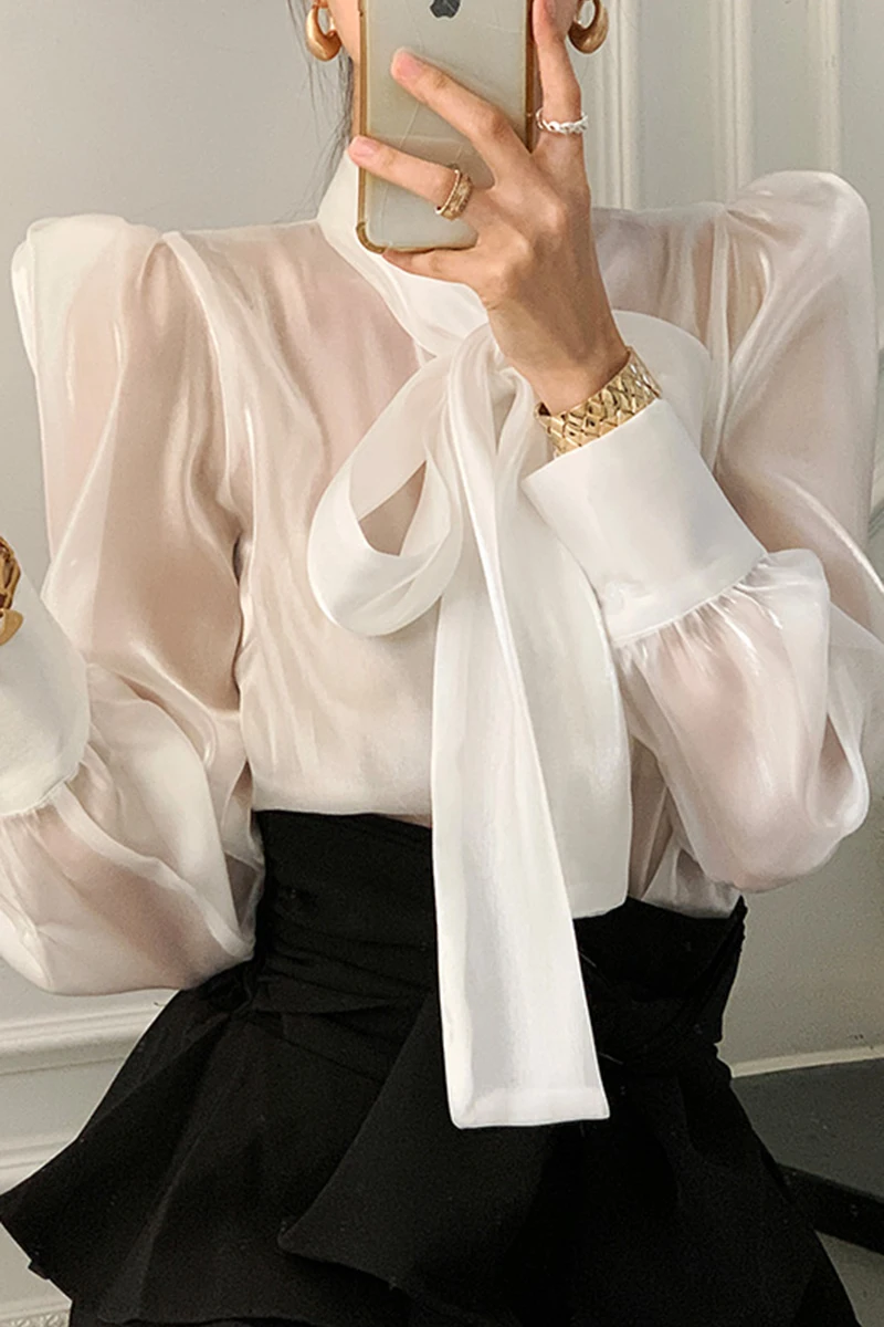 

2021 Spring Ladies Simple Bow Tie Stand Collar Long Bubble Sleeve Glossy Single Breasted Shirt Perspective Blouses