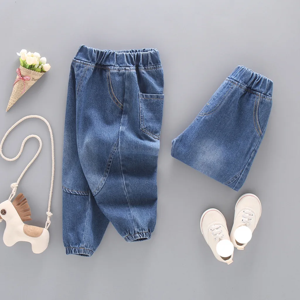 Детские джинсы с широкими штанинами однотонные свободные изогнутыми для