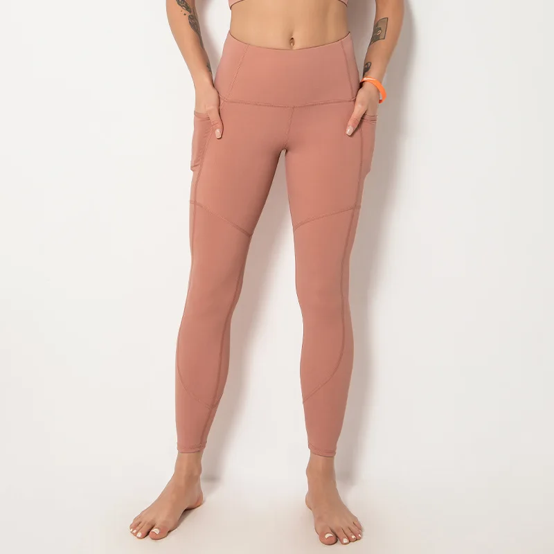 

Yoga pants women's pocket stitching nude fabric high stretch running sports tights Beam leg pants Seamless High Waist Leggings