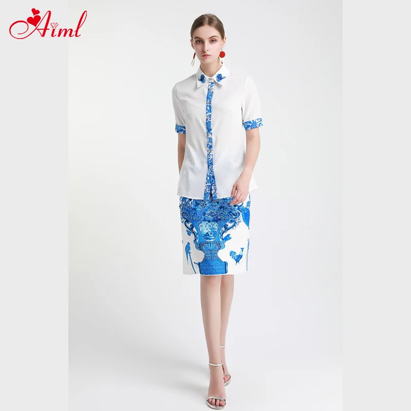 

Designer 2020 Summer 2 Piece suit Lapel bead Short sleeve White vintage Print Blouse Plant Print Midi Skirt Fashion Lady set New