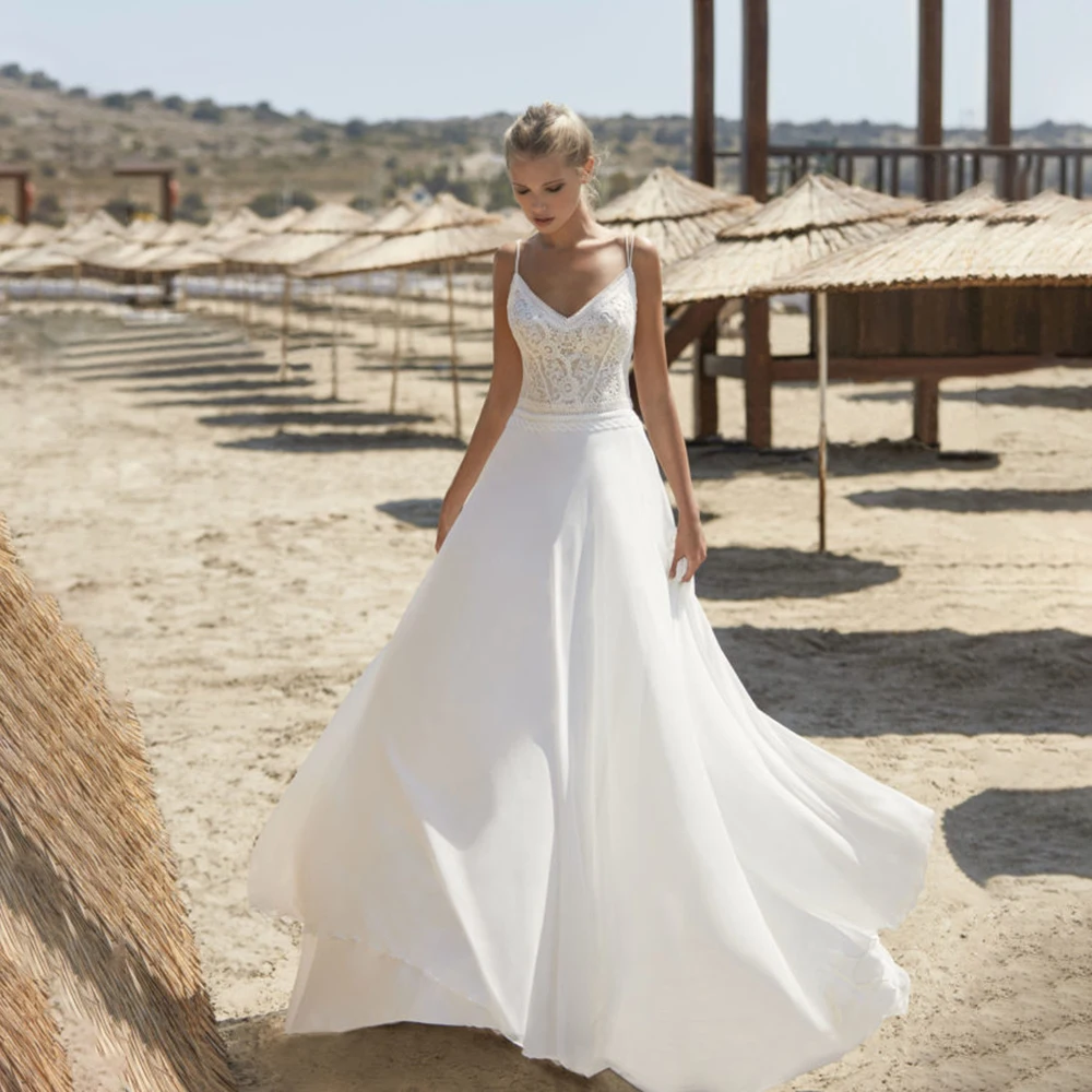 

UETEEY Beach Spaghetti Straps Wedding Dress A-Line V-Neck Sleeveless Appliques Chiffon Sweep Train Bride Gowns Backless 2021