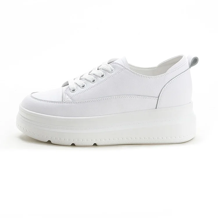 Женские кроссовки из натуральной кожи белые на танкетке толстой