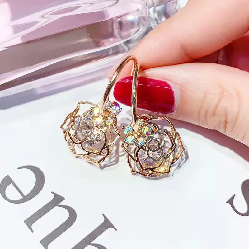 

Silver needle zircon hollow rose earrings female fashion personality pendant simple temperament wholesale earrings free shipping