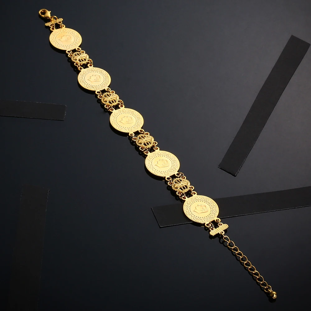 Женский и мужской браслет украшенный драгоценными Монетами Золотого Цвета с