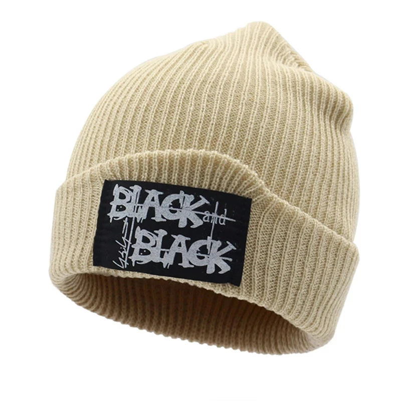 

Fashion Sticking Cloth Label Winter Hats For Woman Casual Beanies Caps Men Women Warm Solid Knitted Cap Winter Outdoors Hat