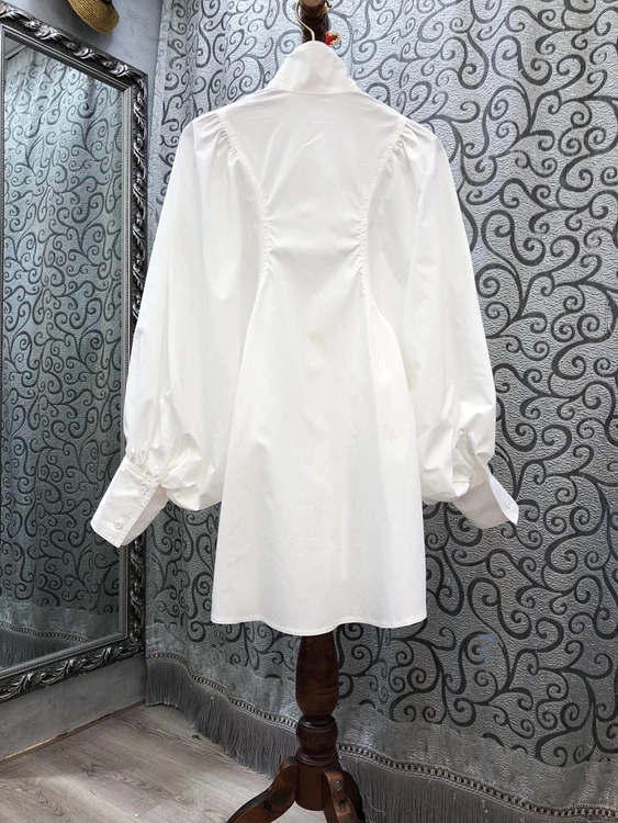 

2020 autumn and winter new women's stand-up collar irregular sleeve stitching decorative button long-sleeved mid-length shirt