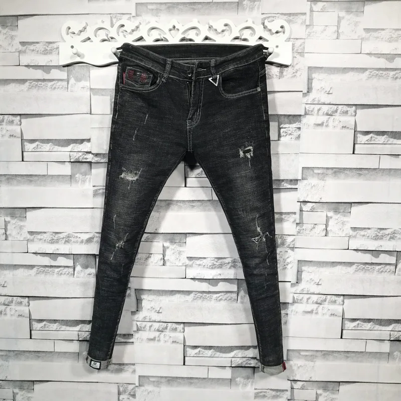 

spring Autumn 2021 black shaved washed distressed hot jeans men's youth Korean slim and thin all-match teenager pencil pants