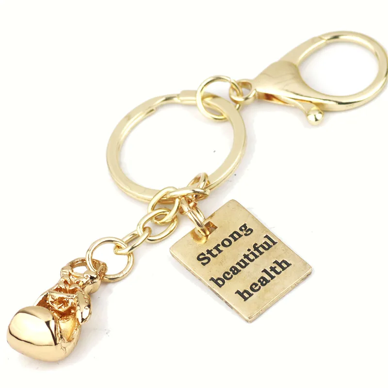 Брелок боксерская перчатка мужской брелок золотого цвета из нержавеющей стали